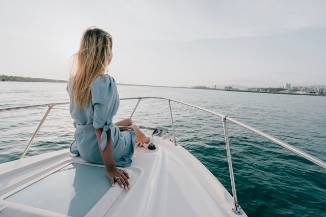 Woman in a yacht enjoying of the Caribean Sea